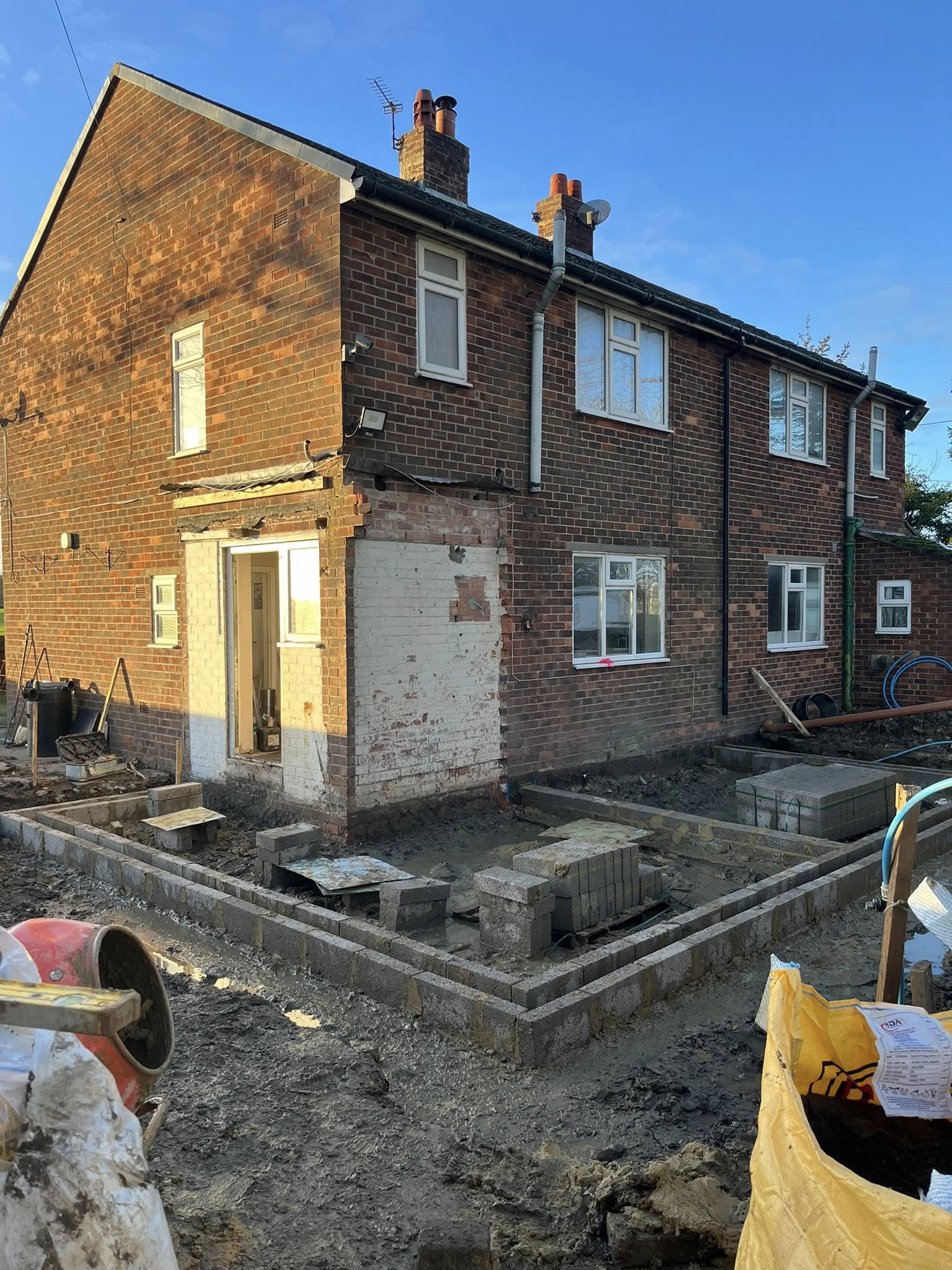 Damaged garden section before construction work
